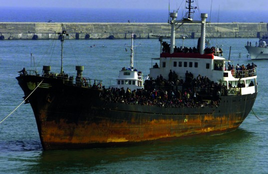 SOME 1,000 IMMIGRANTS WAIT TO LEAVE THE MONICA AFTER ARRIVING INCATANIA.
