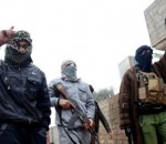 gunmen-fighters-walk-in-the-gunmen-fighters-walk-in-the-streets-of-the-city-of-falluja-50-km-31-miles-west-of-baghdad_4654366