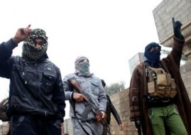 gunmen-fighters-walk-in-the-gunmen-fighters-walk-in-the-streets-of-the-city-of-falluja-50-km-31-miles-west-of-baghdad_4654366